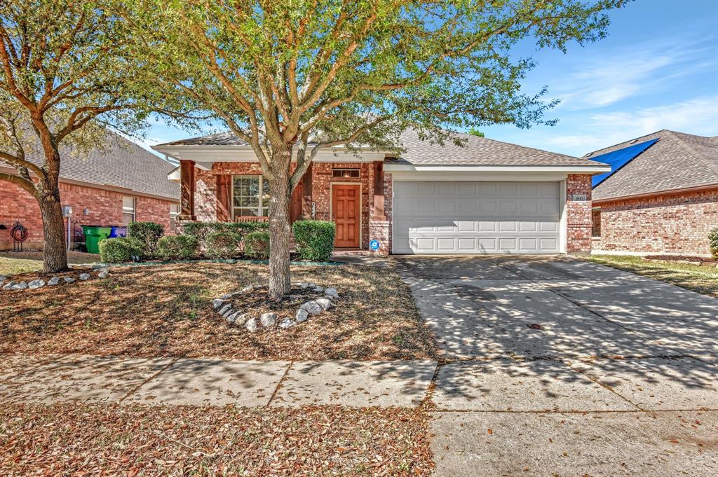 3517 Timber Ridge Trail McKinney, TX 75071 - Photo 1 of 1 a backyard of a house with large trees and brick walls