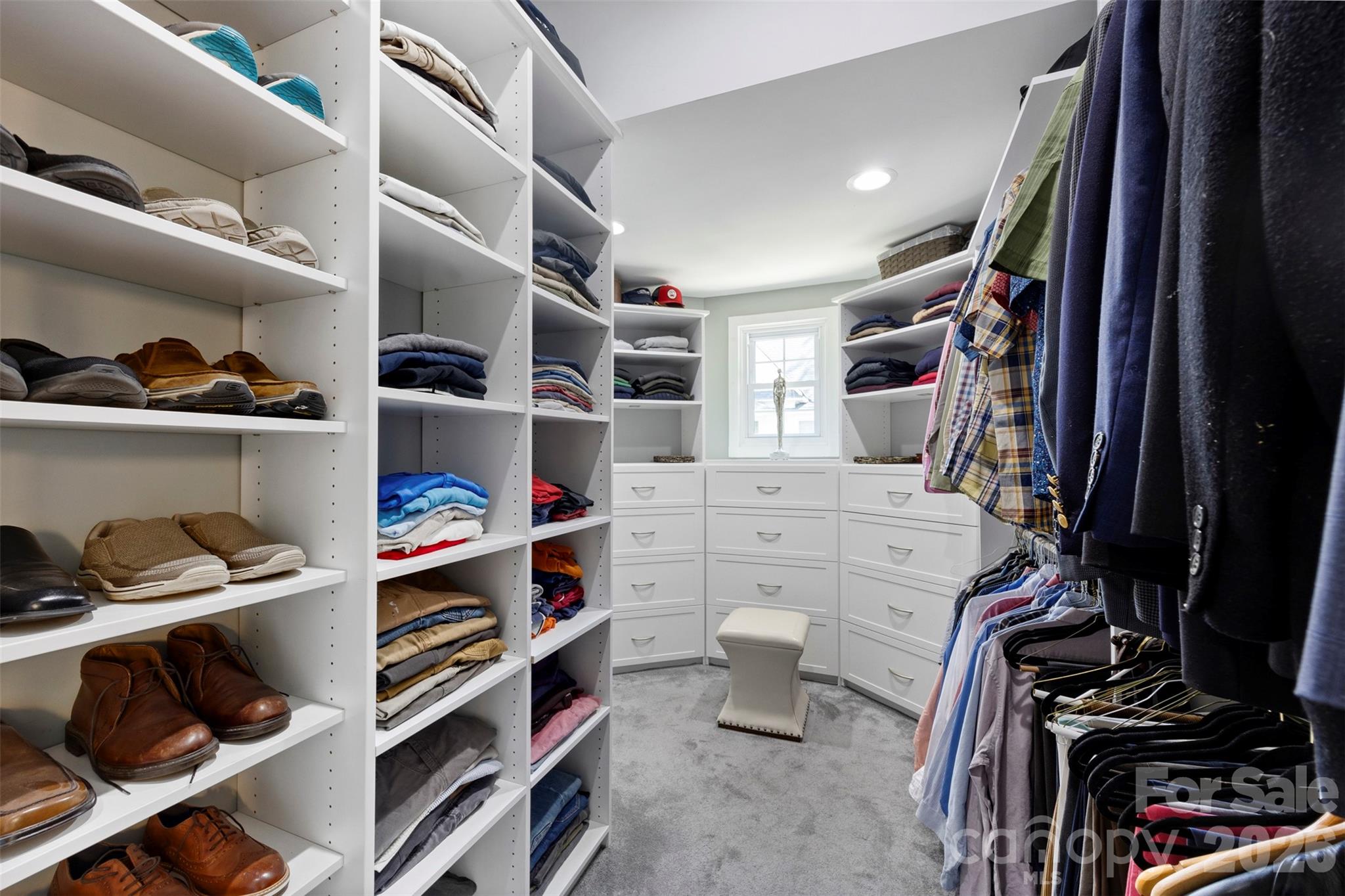 207 West Academy Street Cherryville, NC 28021 - Photo 25 of 45 a view of walk in closet with clothes and shoes