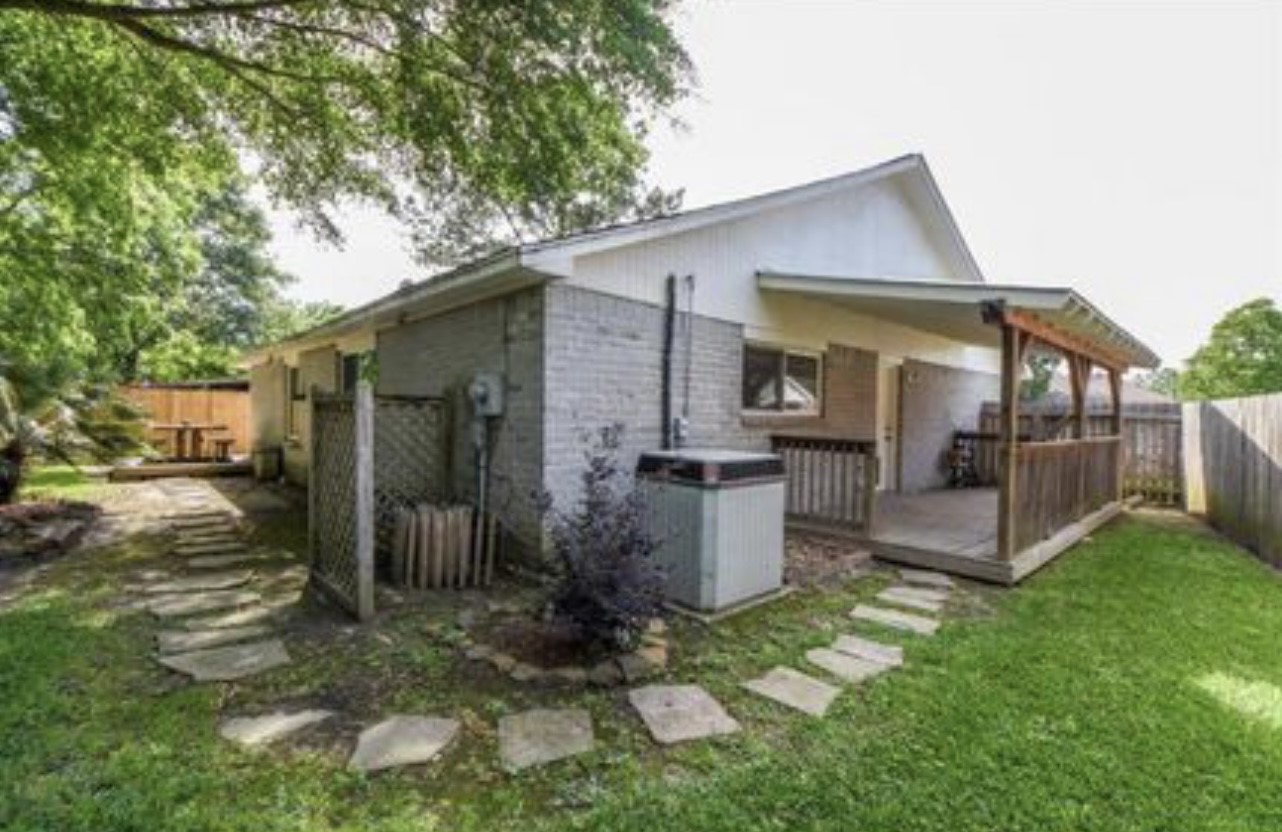 5906 Flower Gate Drive Spring, TX 77373 - Photo 5 of 7 a view of a back yard of the house