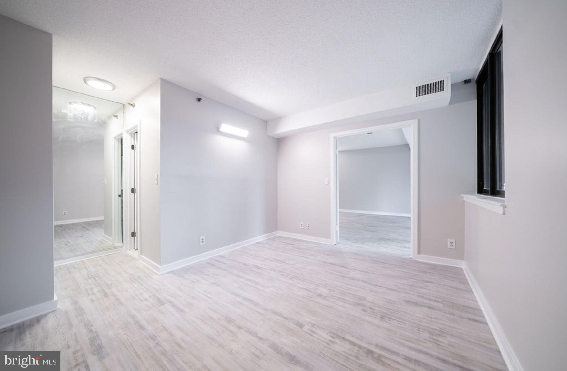 5505 Seminary Road, Unit 103N Falls Church, VA 22041 - Photo 25 of 59 a view of empty room with wooden floor