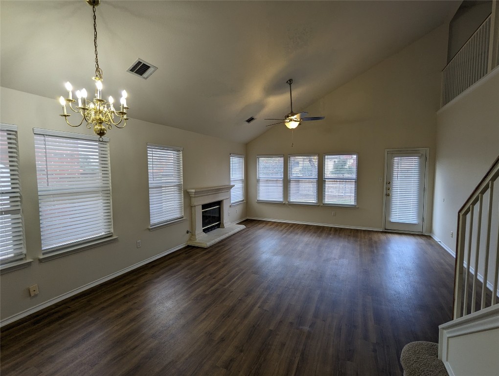 13512 Albania Way Austin, TX 78729 - Photo 2 of 24 a view of an empty room with wooden floor and a window