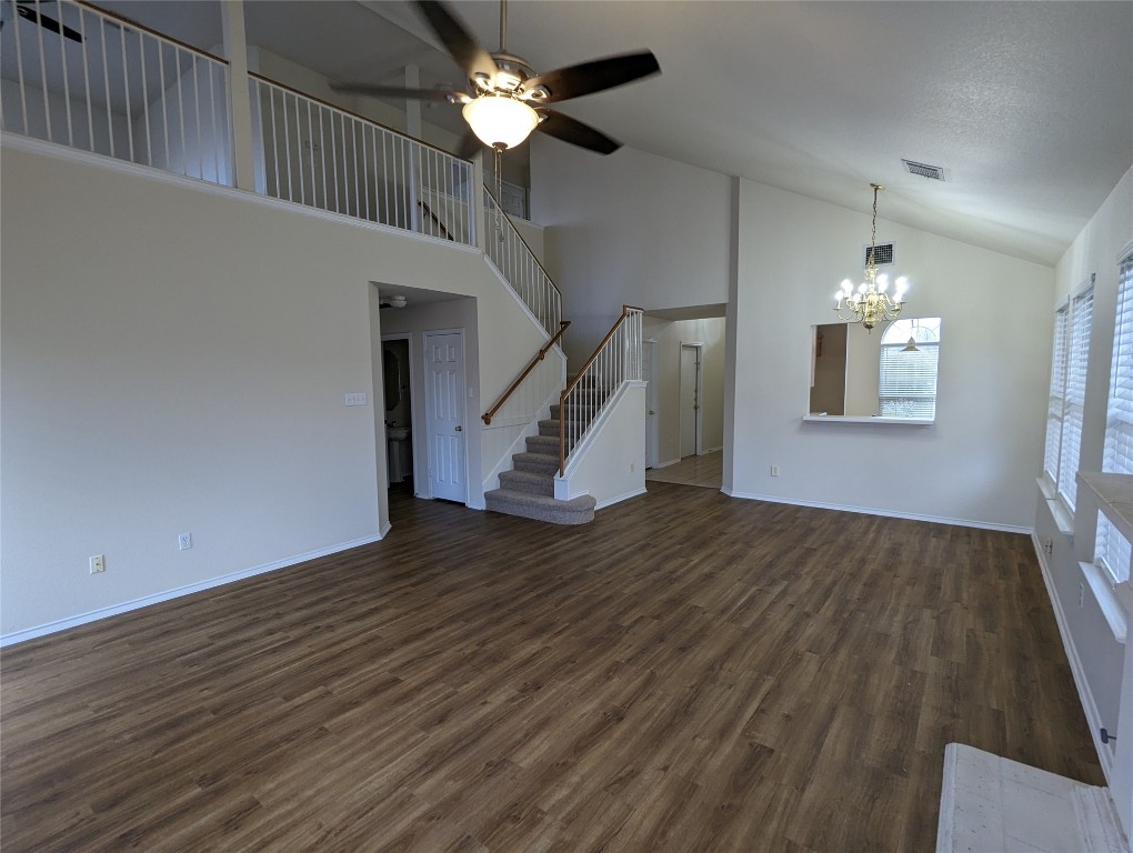 13512 Albania Way Austin, TX 78729 - Photo 4 of 24 a view of empty room with wooden floor and fan
