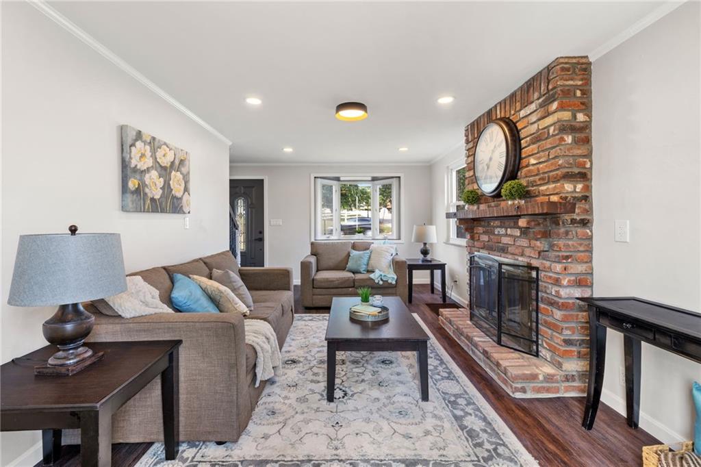 610 Perrymont Road Pittsburgh, PA 15237 - Photo 4 of 18 Cozy living room with fireplace