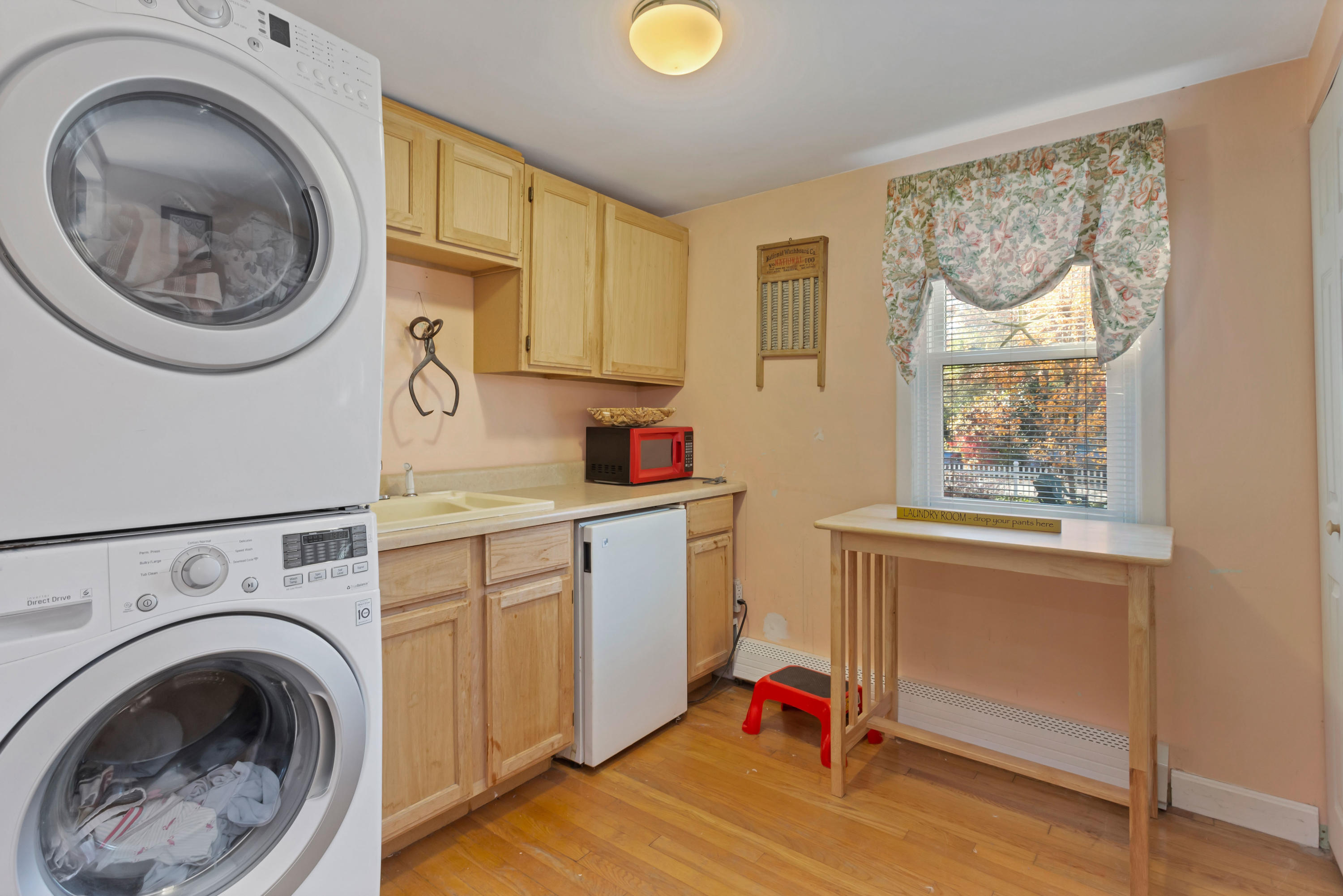 189 Highland Drive Centerville, MA 02632 - Photo 19 of 39 a utility room with sink dryer and washer