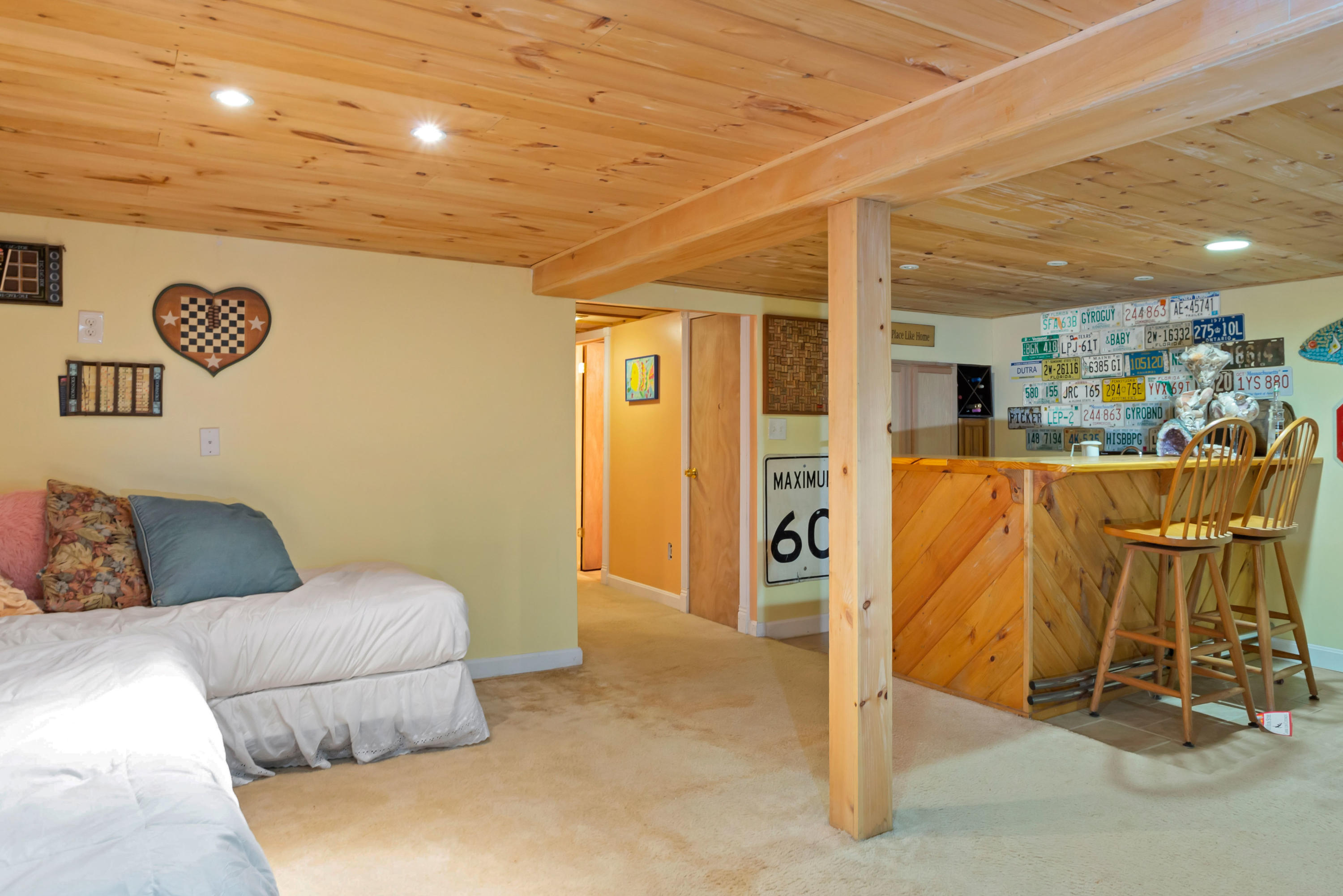 189 Highland Drive Centerville, MA 02632 - Photo 23 of 39 a living room with a couch and gym equipment