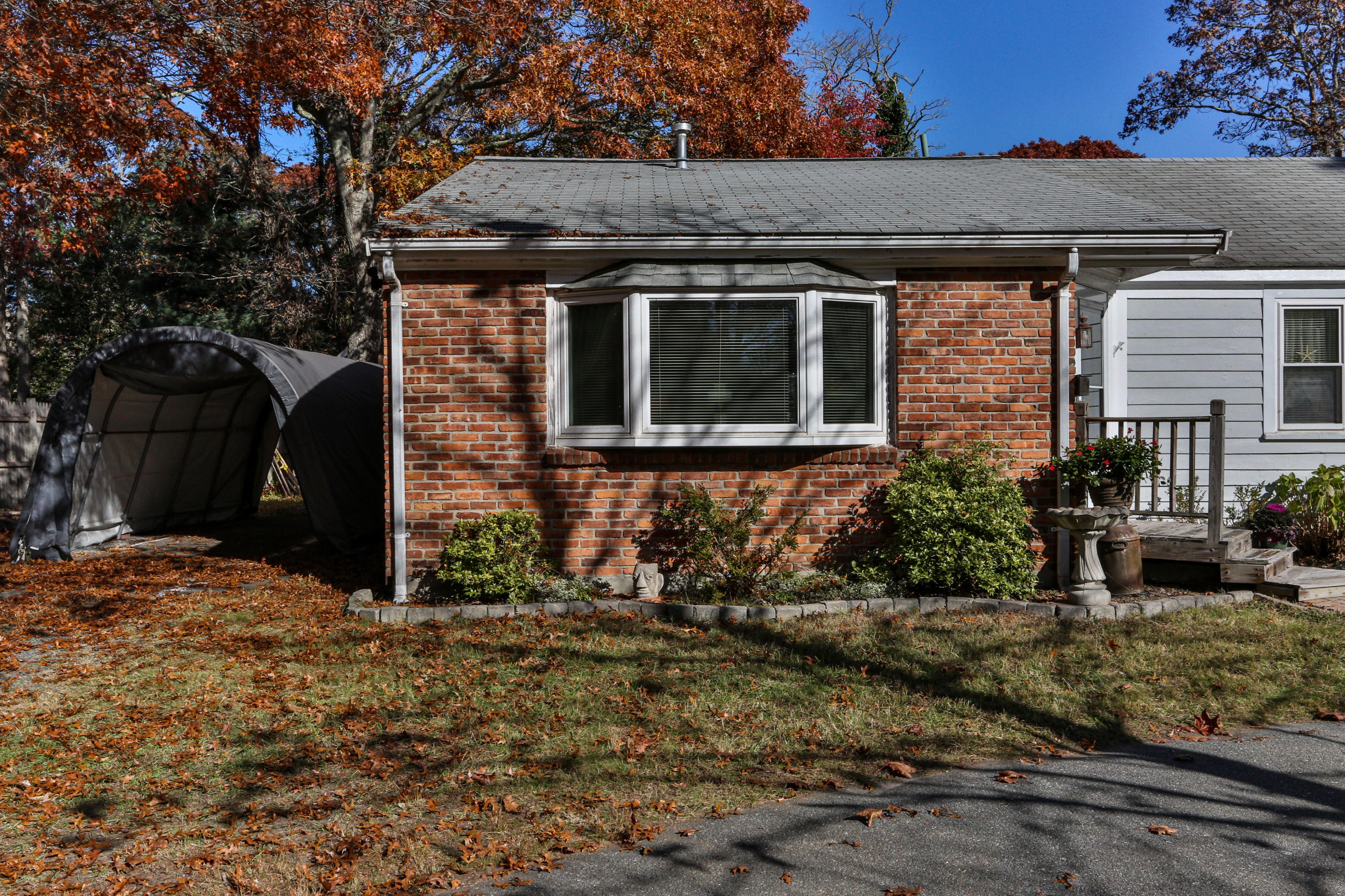 189 Highland Drive Centerville, MA 02632 - Photo 28 of 39 a view of a house with a yard