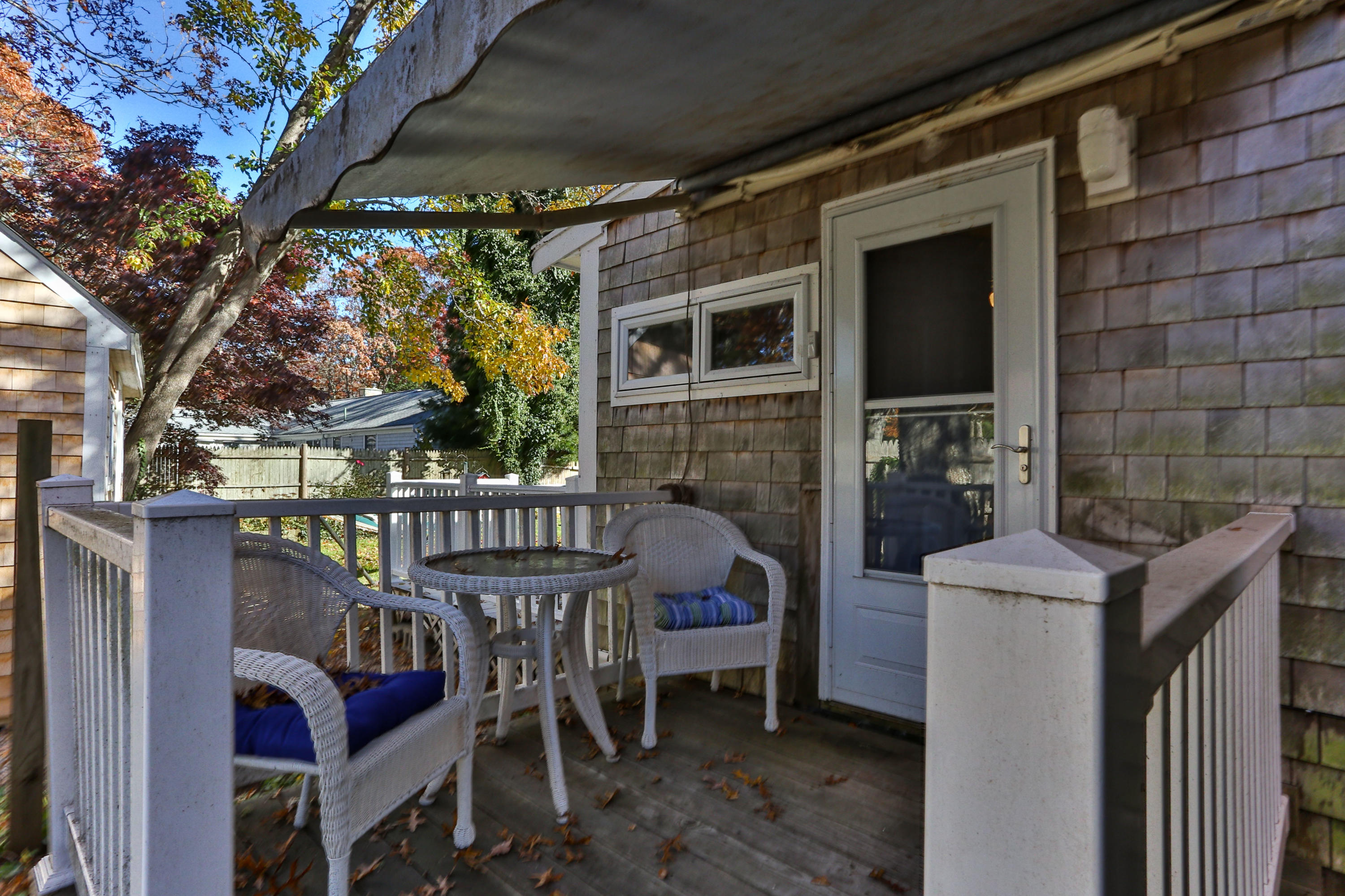189 Highland Drive Centerville, MA 02632 - Photo 36 of 39 a patio with table and chairs