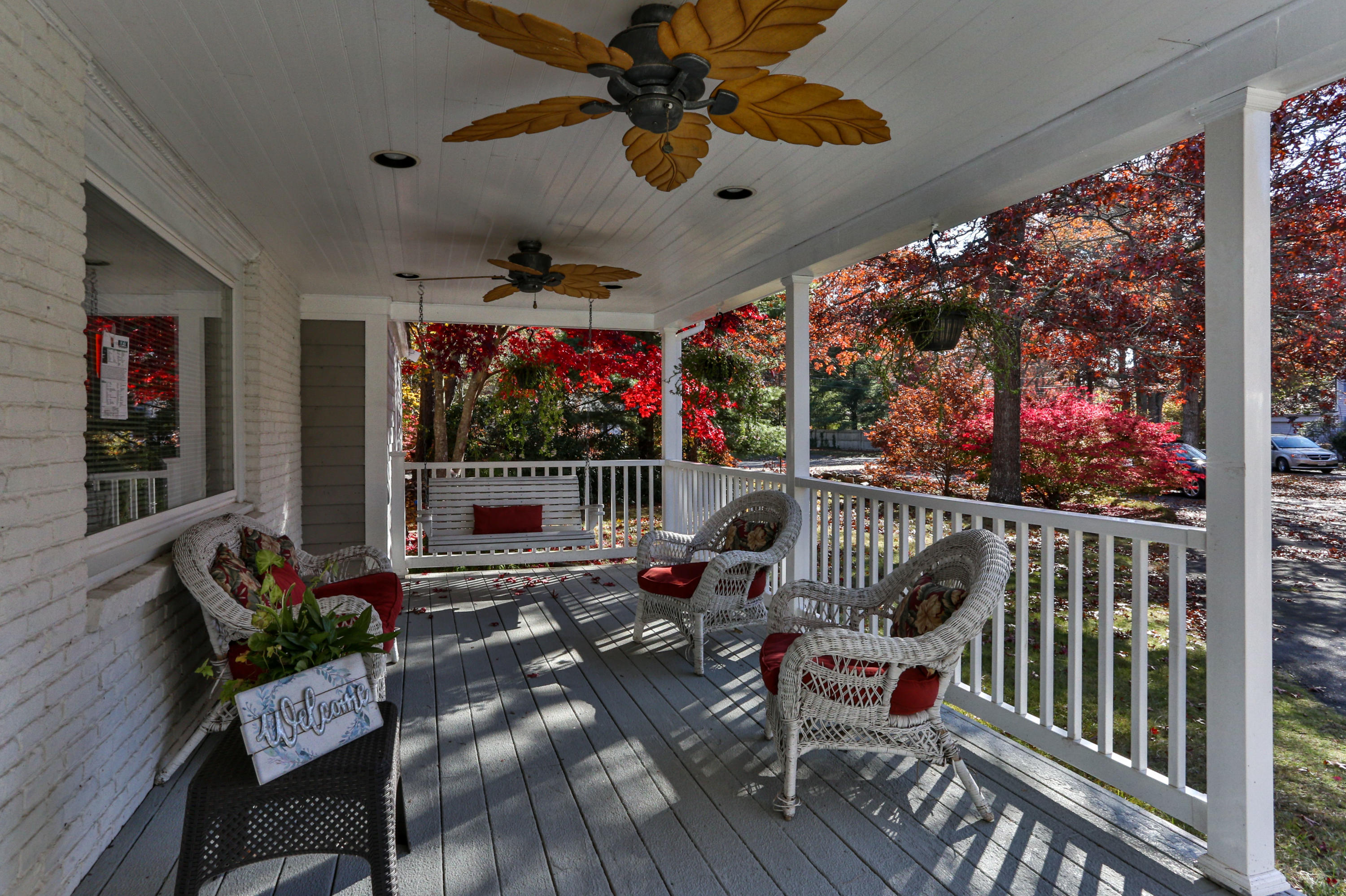 189 Highland Drive Centerville, MA 02632 - Photo 6 of 39 a view of a chairs and tables in patio