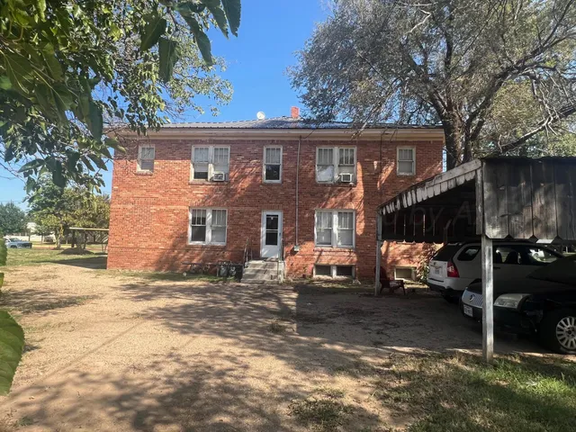 a view of a house with a patio