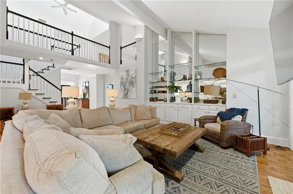 a living room with furniture and a table