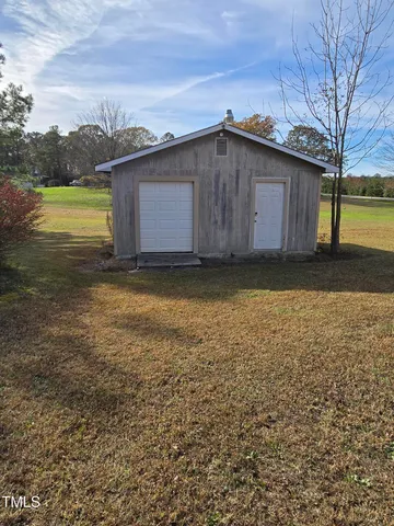 a house view with a outdoor space