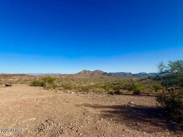 a view of mountain with sunset view