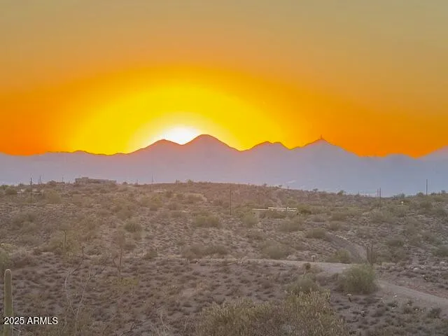 a view of an outdoor space with mountain view