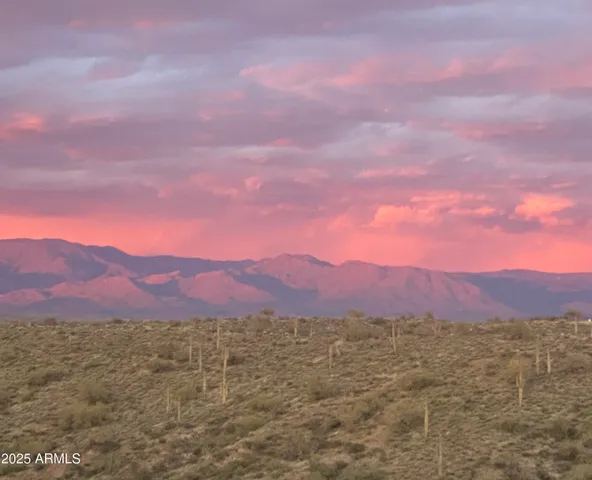 a view of a lake with a mountain