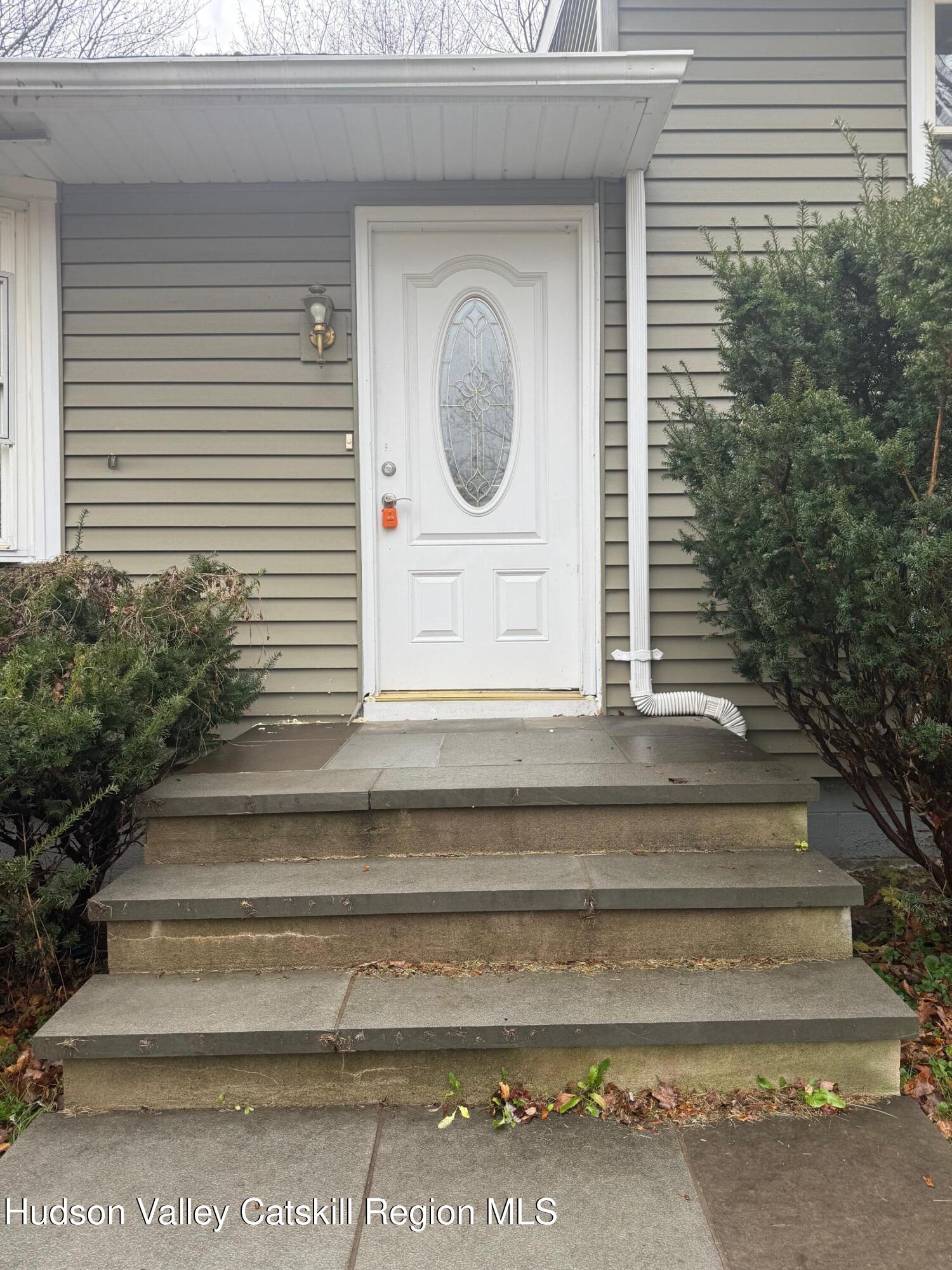 6 Van Orden Road Milton, NY 12547 - Photo 3 of 21 a front view of a house with a porch