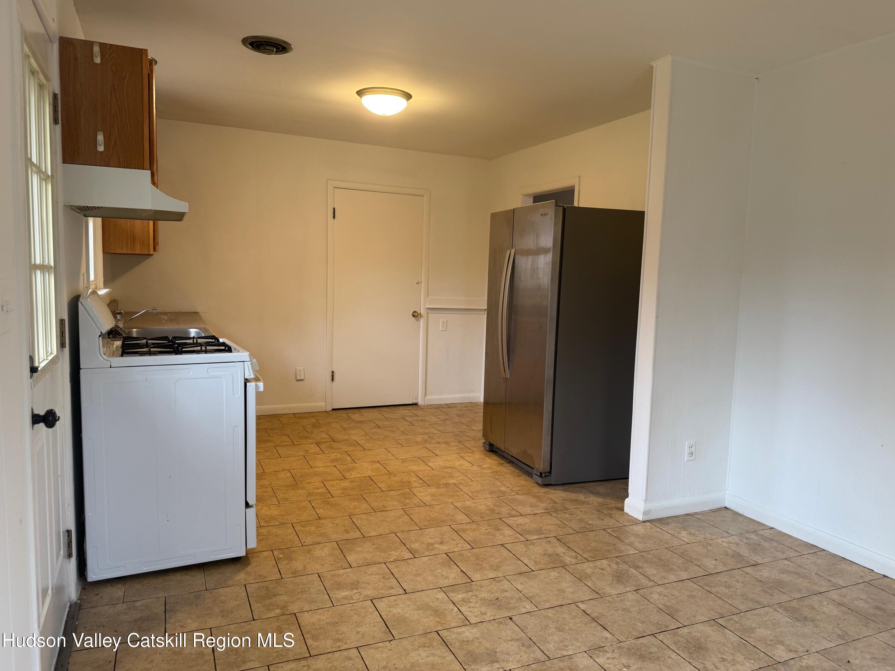 6 Van Orden Road Milton, NY 12547 - Photo 8 of 21 a view of kitchen with refrigerator and cabinets