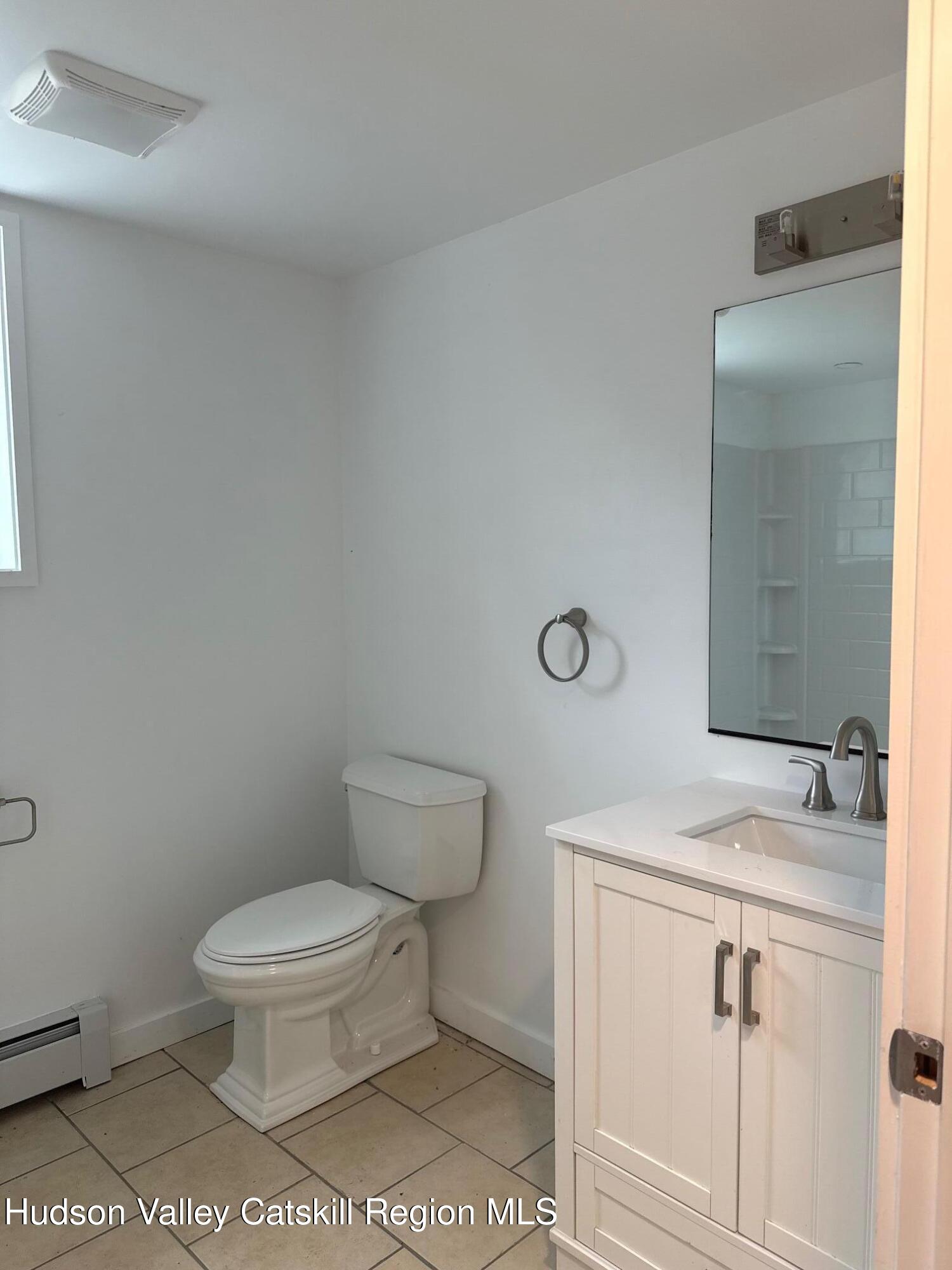 6 Van Orden Road Milton, NY 12547 - Photo 10 of 21 a bathroom with a sink a toilet and a mirror