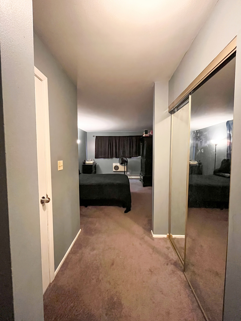 1313 A South Rebecca Road, Unit 218 Lombard, IL 60148 - Photo 11 of 19 a view of a livingroom with a kitchen
