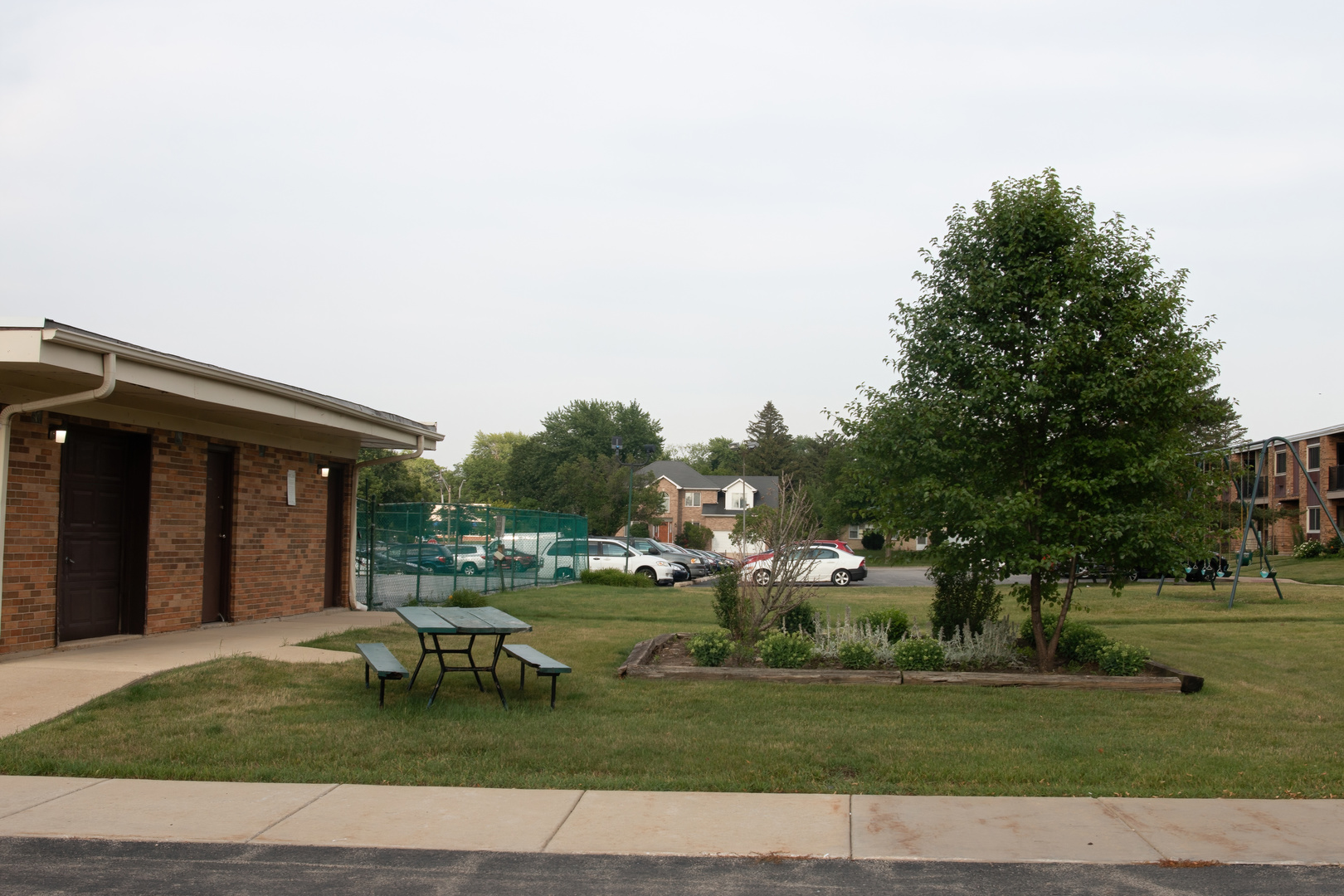 1313 A South Rebecca Road, Unit 218 Lombard, IL 60148 - Photo 19 of 19 a view of a house with a yard