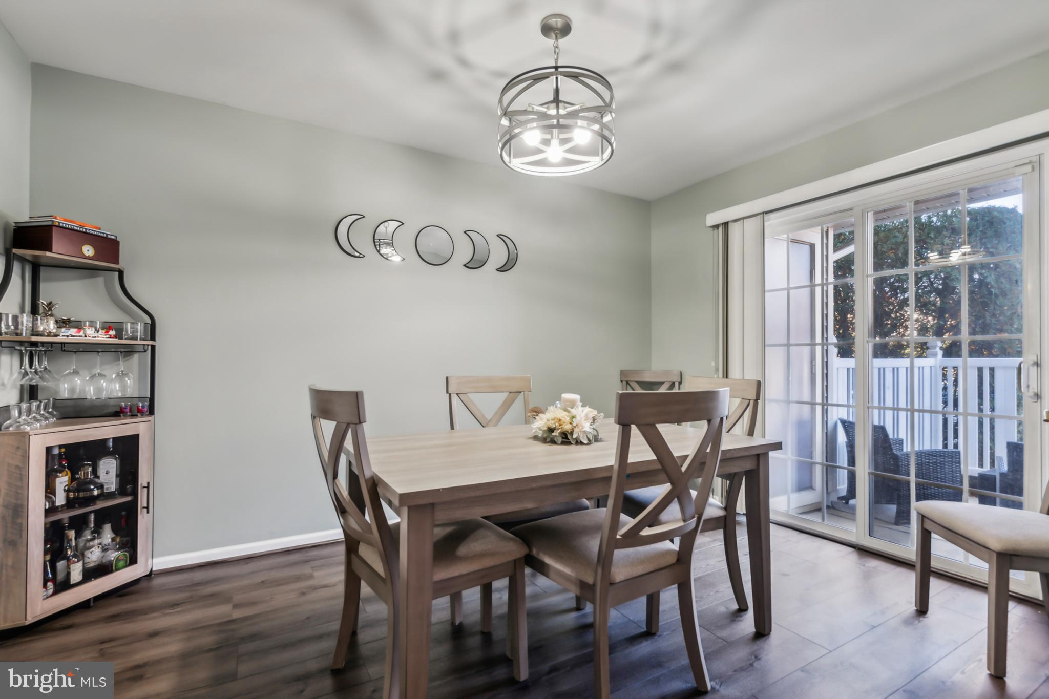 1102 Coventry Way Mount Laurel, NJ 08054 - Photo 14 of 24 a view of a dining room with furniture wooden floor and a window