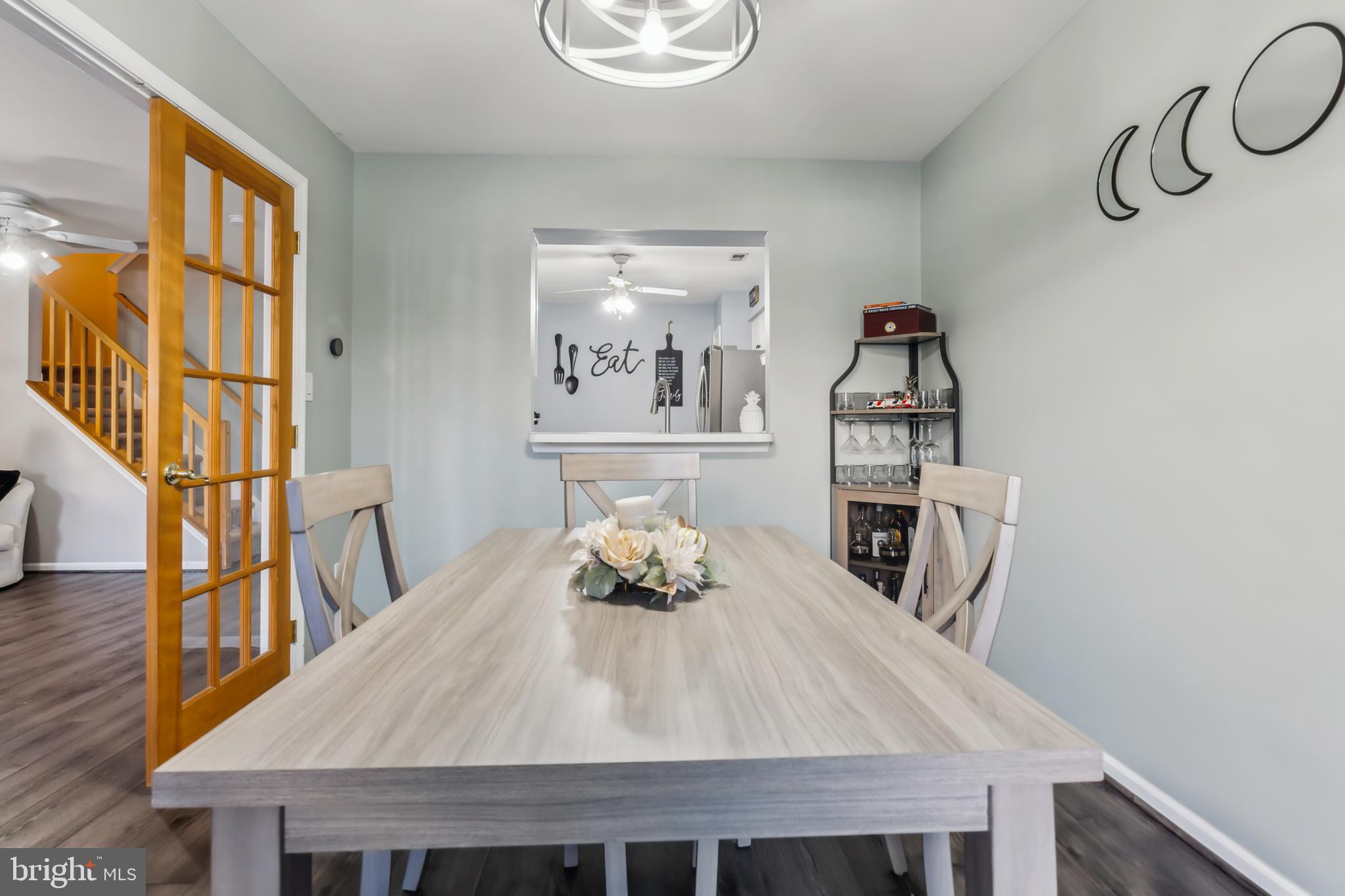 1102 Coventry Way Mount Laurel, NJ 08054 - Photo 15 of 24 a living room with table chairs and wooden floor