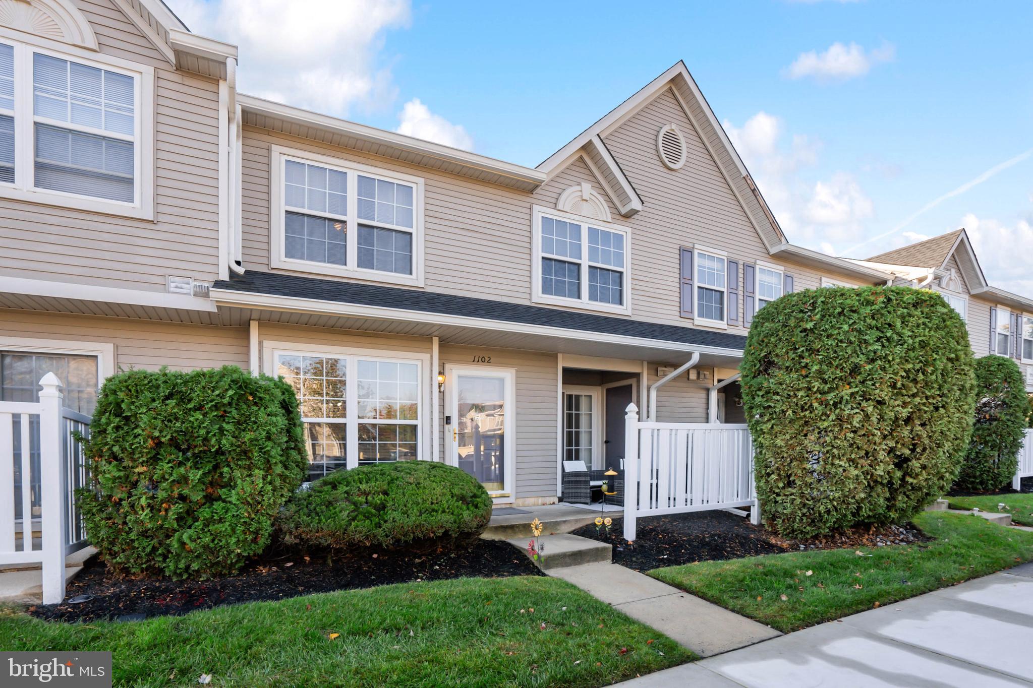 1102 Coventry Way Mount Laurel, NJ 08054 - Photo 2 of 24 a front view of a house with garden