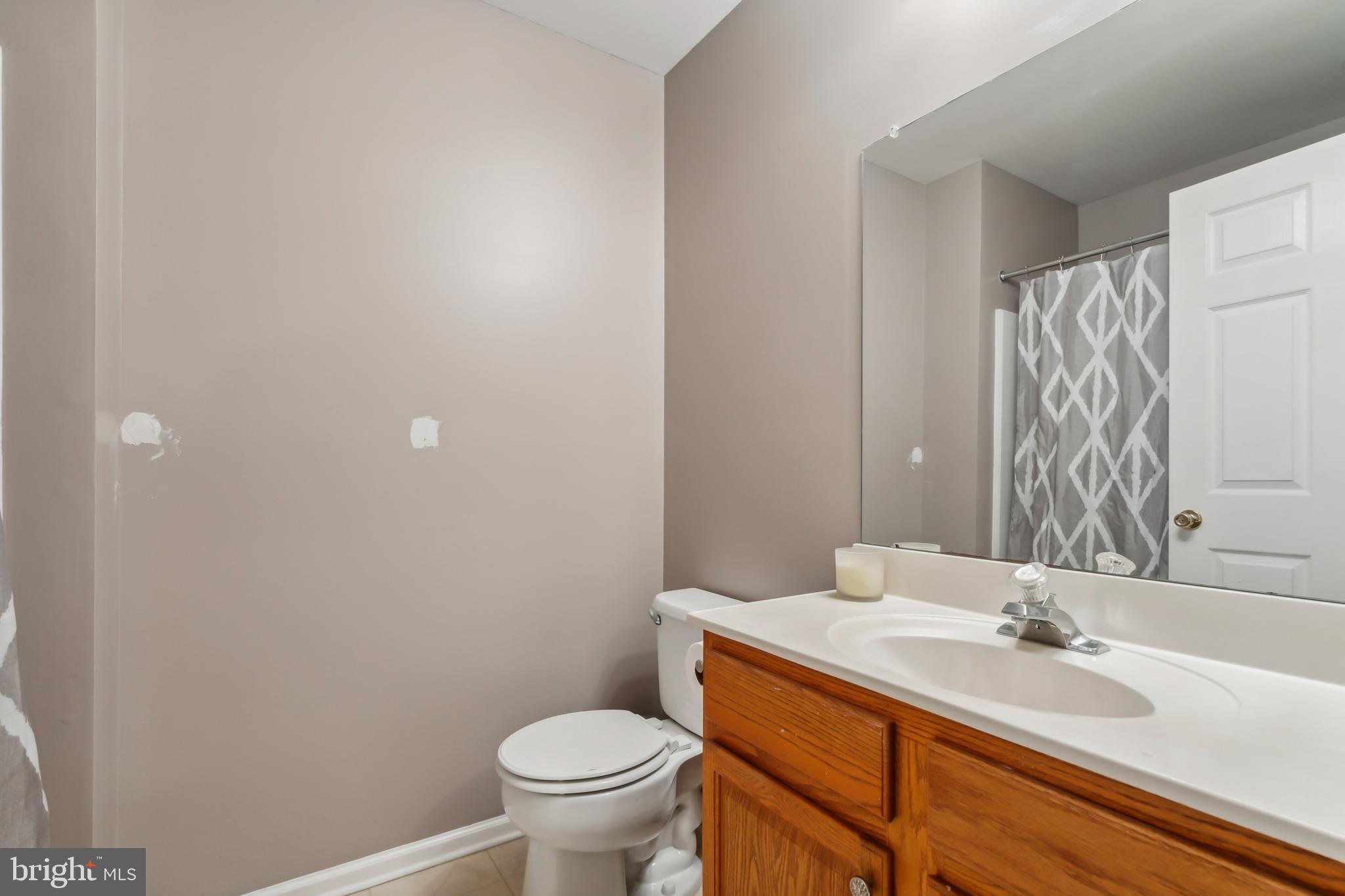 1102 Coventry Way Mount Laurel, NJ 08054 - Photo 22 of 24 a bathroom with a sink and a toilet