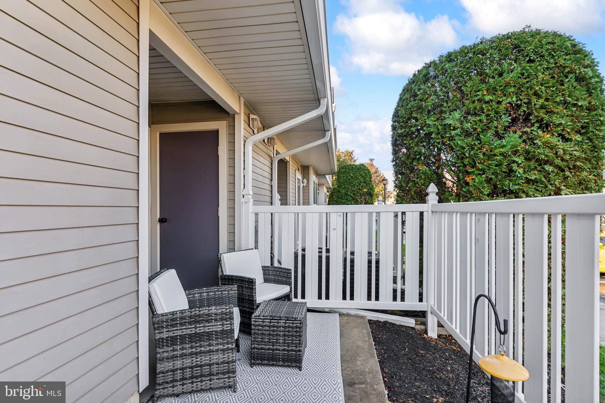1102 Coventry Way Mount Laurel, NJ 08054 - Photo 24 of 24 a view of a wooden door and a bench