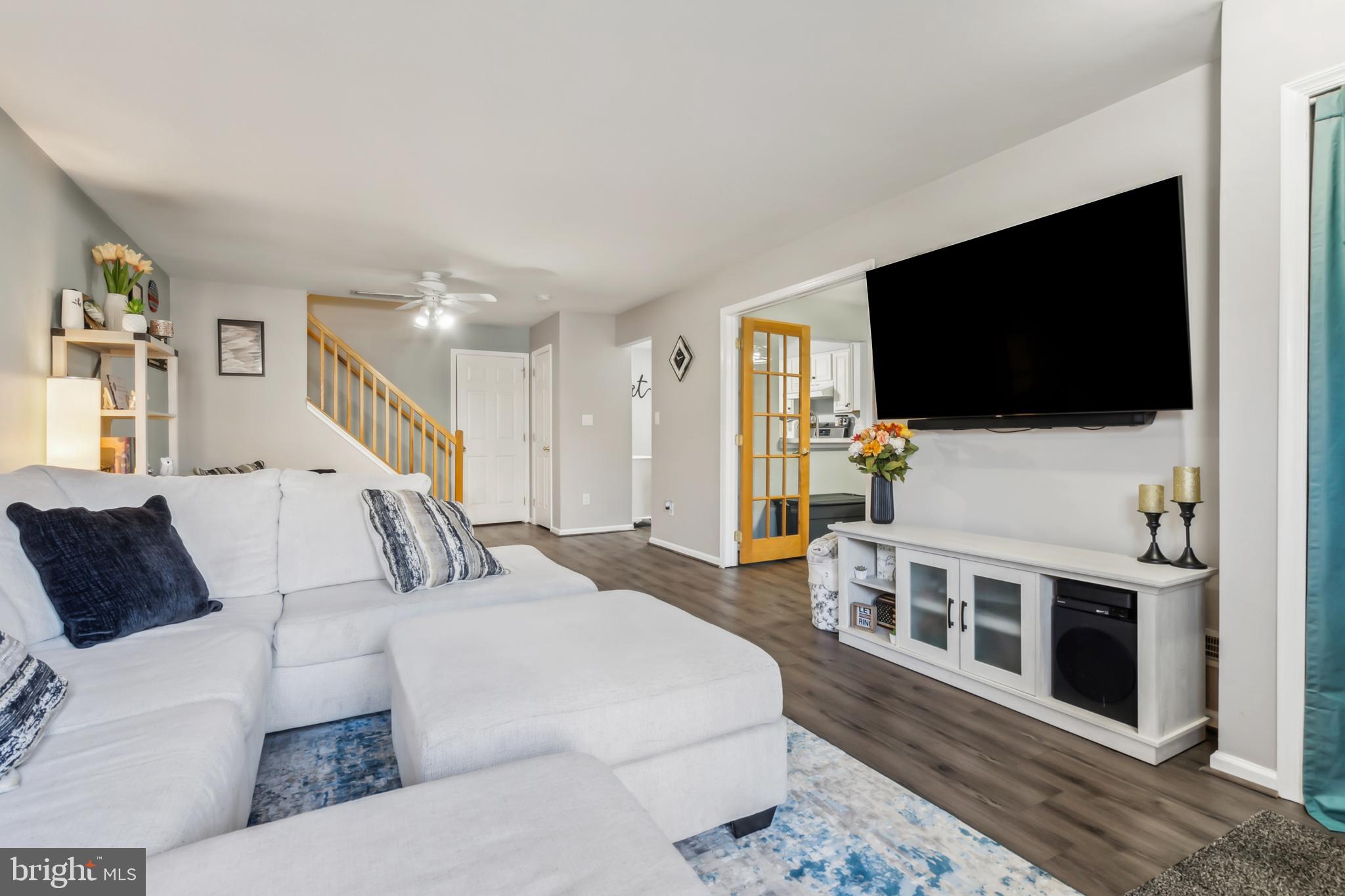 1102 Coventry Way Mount Laurel, NJ 08054 - Photo 4 of 24 a living room with furniture and a flat screen tv