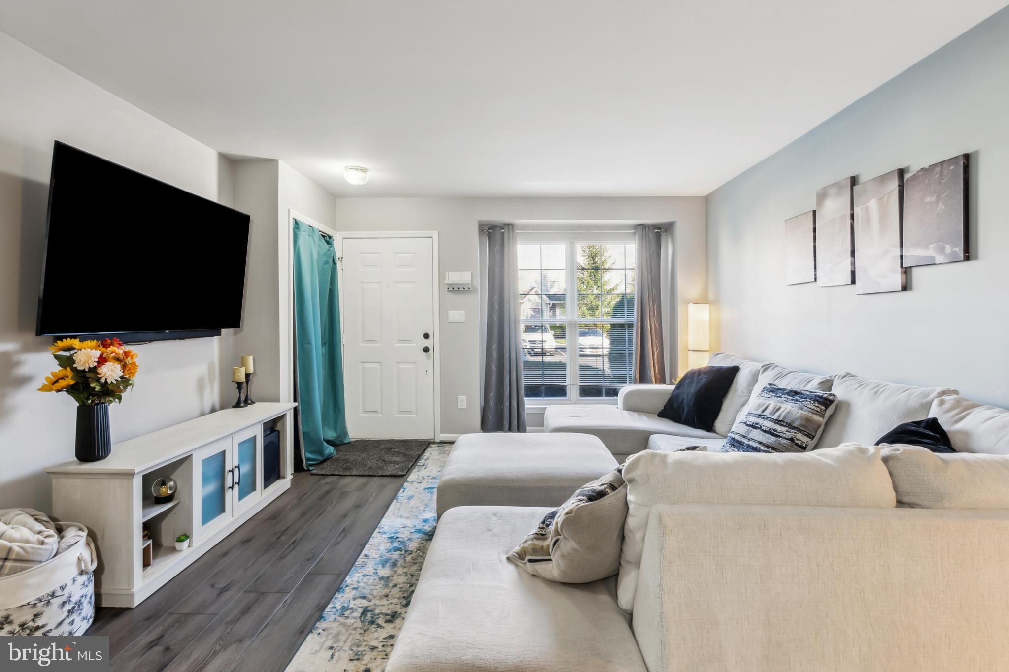 1102 Coventry Way Mount Laurel, NJ 08054 - Photo 6 of 24 a bedroom with furniture and a flat screen tv