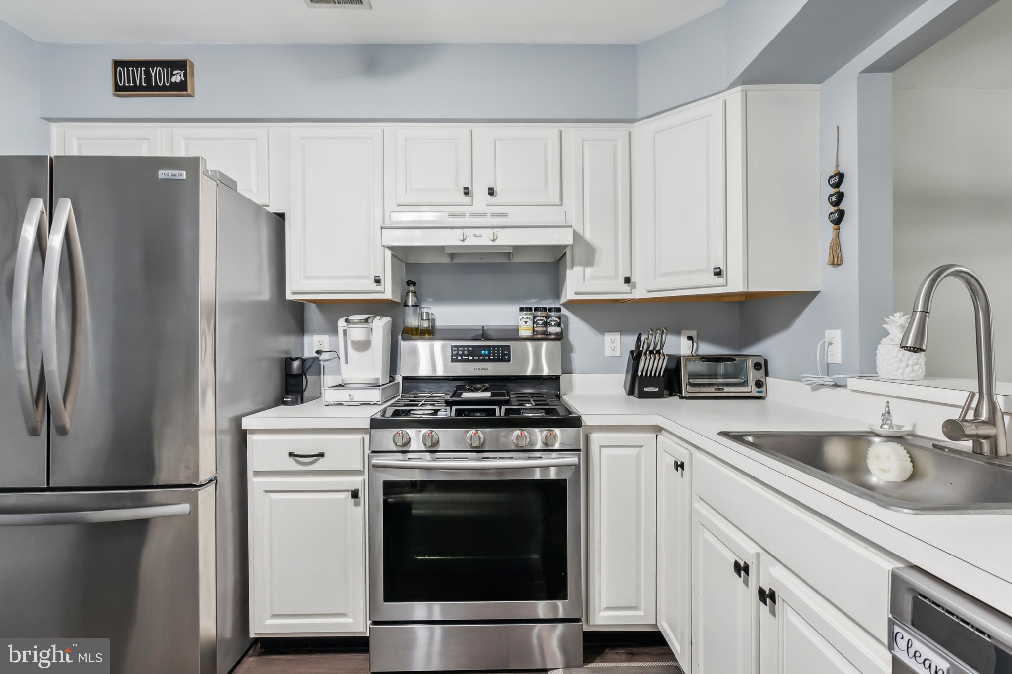 1102 Coventry Way Mount Laurel, NJ 08054 - Photo 10 of 24 a kitchen with cabinets stainless steel appliances and a sink