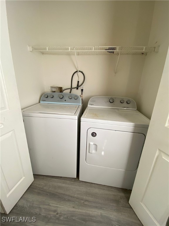 5527 Judith Road, Unit B Bokeelia, FL 33922 - Photo 6 of 8 a utility room with dryer and washer