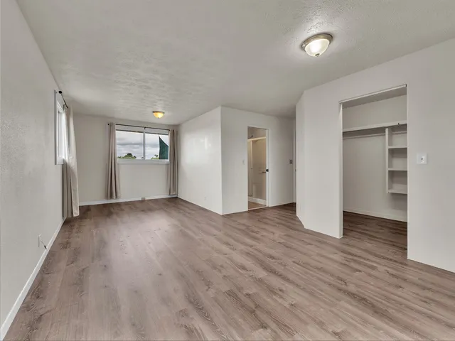 an empty room with windows and outer view