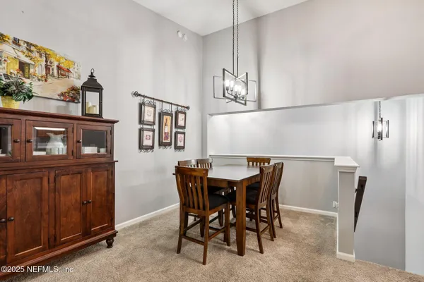 a view of a dining room with furniture