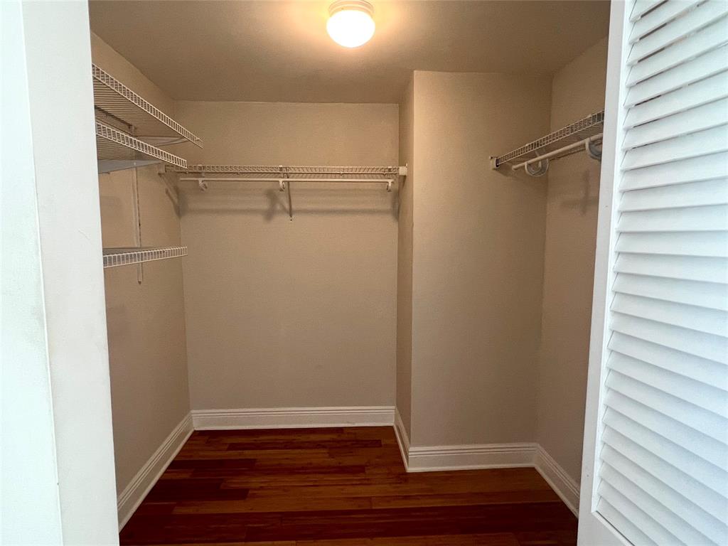 7275 Southwest 89th Street, Unit B520 Miami, FL 33156 - Photo 9 of 26 a view of an empty walk in closet