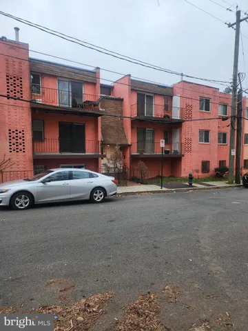 a car parked in front of a building