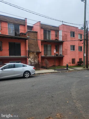 a car parked in front of a building