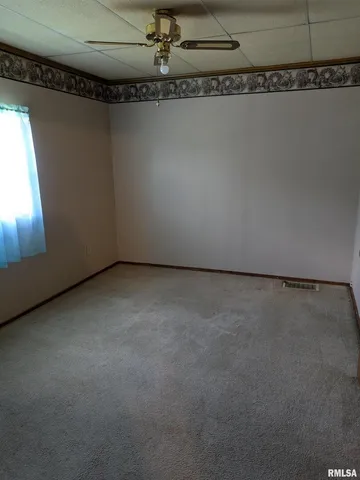 a view of a room with an empty space