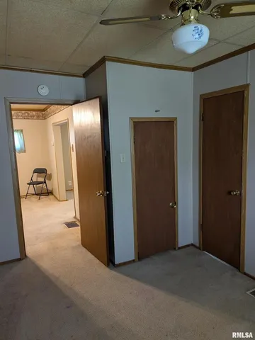 a view of a hallway with workspace