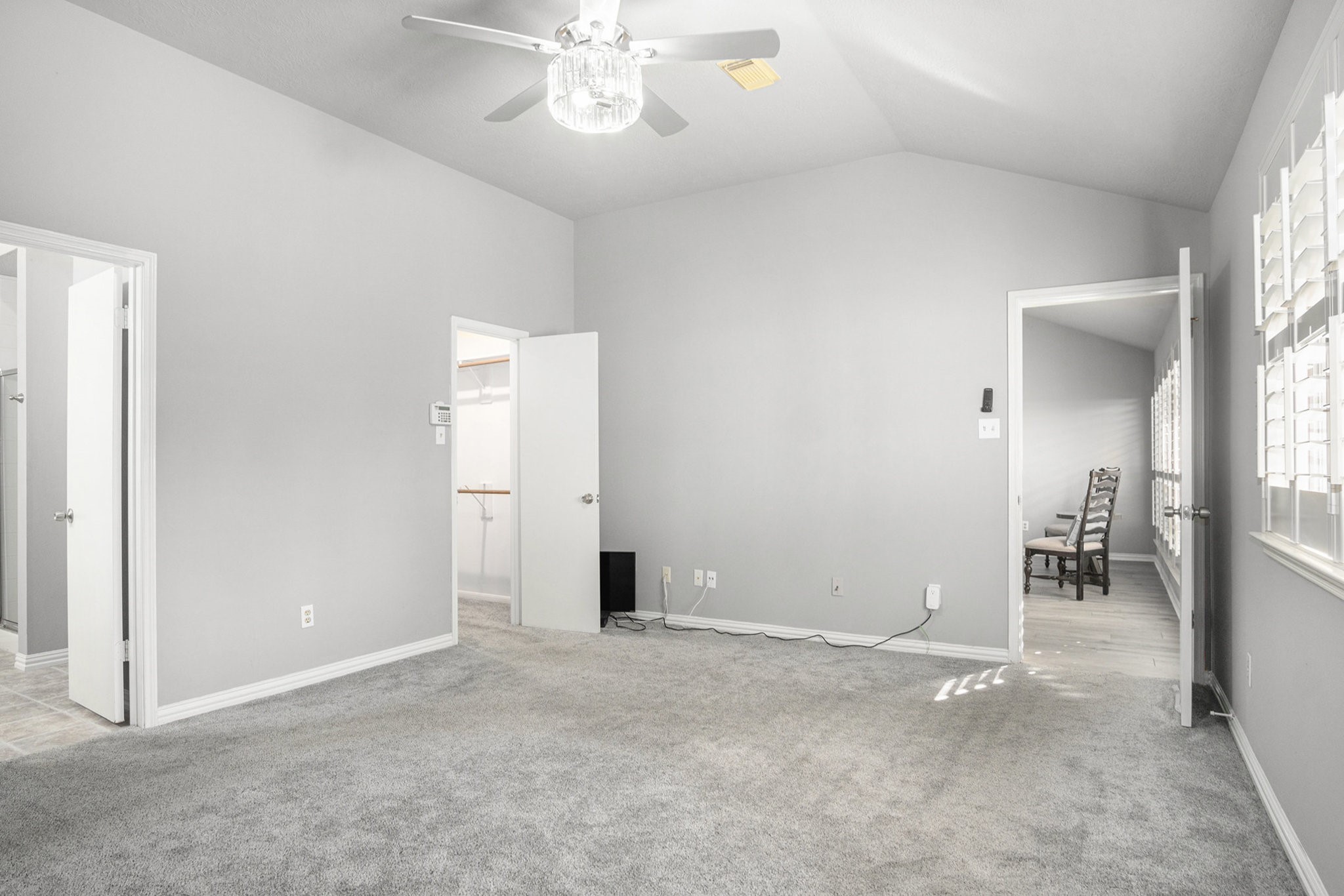 3315 Mourning Dove Drive Spring, TX 77388 - Photo 29 of 44 an empty room with chandelier fan and windows