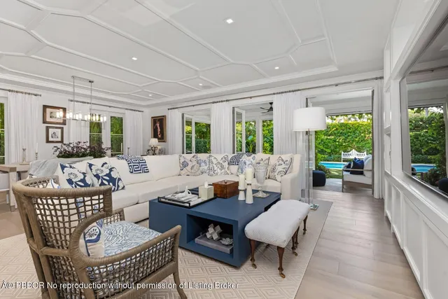 a view of a dining room with furniture and window