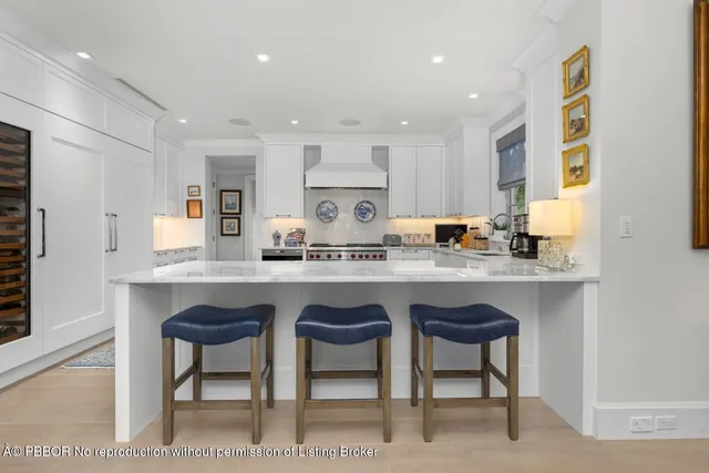 a kitchen with a stove and a sink