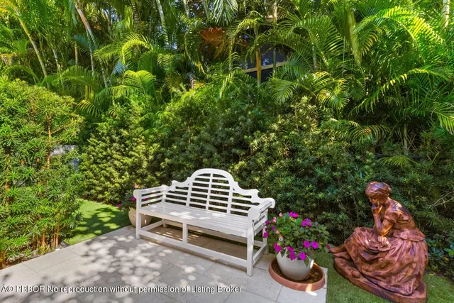 a view of an outdoor dining space with furniture window