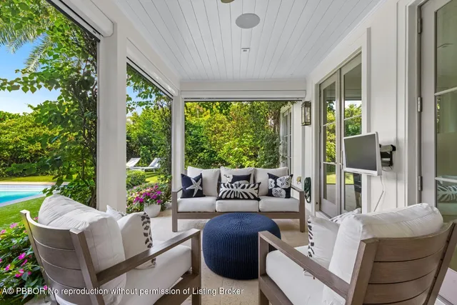 a view of a livingroom with furniture and window