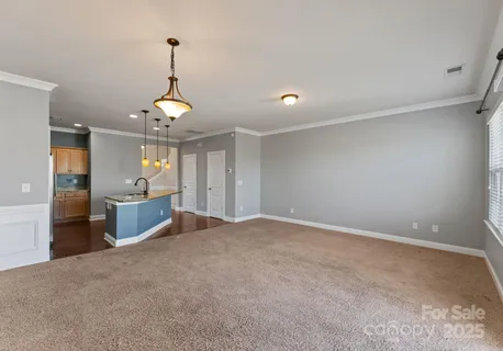 a view of a kitchen and a sink