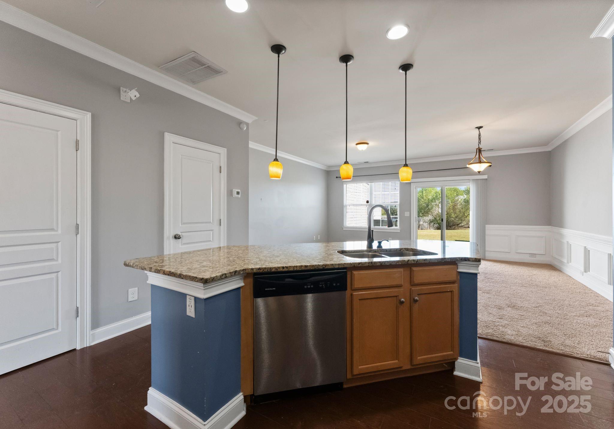 193 Halton Crossing Drive Southwest Concord, NC 28027 - Photo 9 of 20 a kitchen with a sink and window