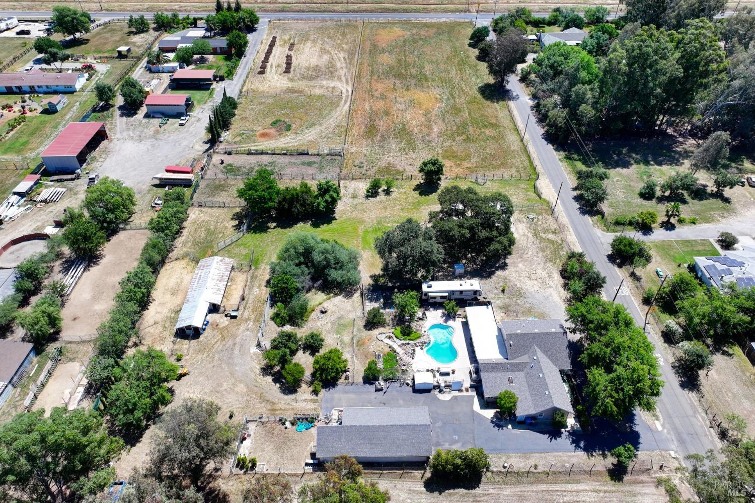 4851 Udell Road Vacaville, CA 95688 - Photo 61 of 65 an aerial view of residential houses with outdoor space