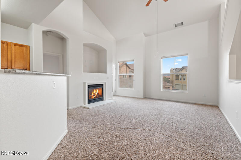 1325 South Meadows Parkway, Unit 621 Reno, NV 89521 - Photo 3 of 18 a view of a livingroom with a fireplace