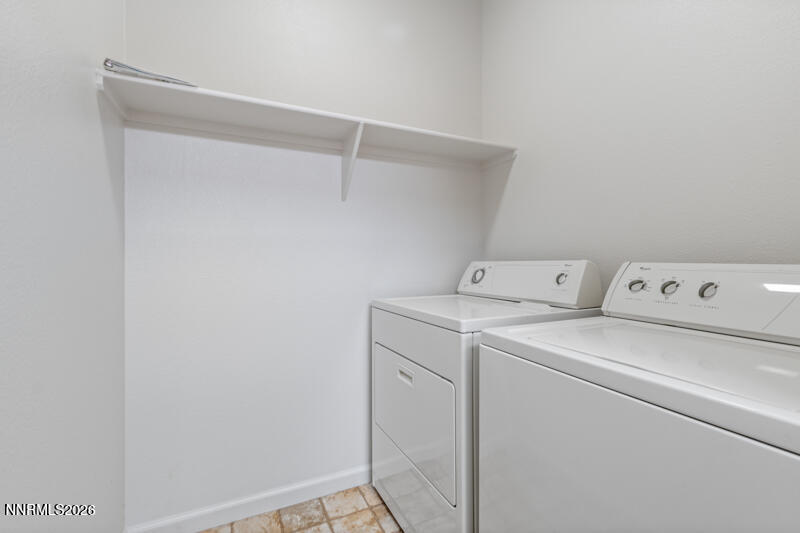 1325 South Meadows Parkway, Unit 621 Reno, NV 89521 - Photo 7 of 18 a view of storage and utility room with washer and dryer