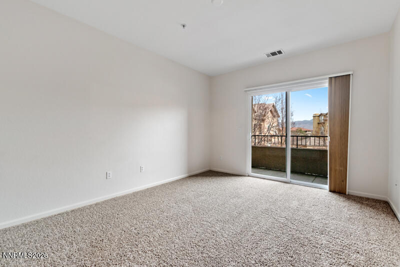 1325 South Meadows Parkway, Unit 621 Reno, NV 89521 - Photo 9 of 18 a view of an empty room with a window